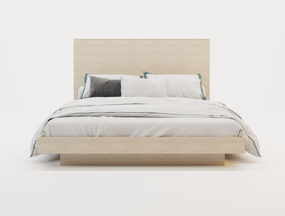 front view of a double bed frame with pillows and sheet in a white background from Isaak