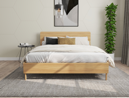 front view of a double bed frame with mattress and pillows in a bedroom from Isaak