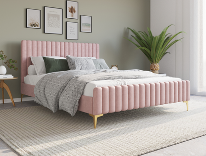 top view of a double bed frame with mattress and pillows in a bedroom from Isaak