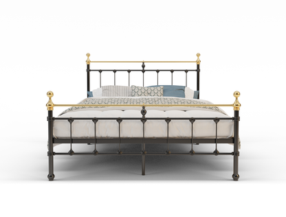 front view of a double bed frame with mattress and pillows in a white background from Isaak