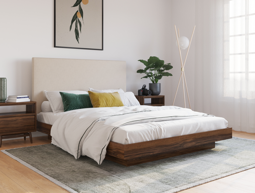 top view of a double bed frame with mattress and pillows in a bedroom from Isaak