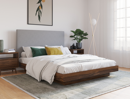 top view of a king bed frame with mattress and pillows in a bedroom from Isaak