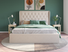 front view of a queen bed frame with mattress and pillows in a bedroom from Isaak