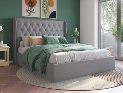 top view of a double bed frame with mattress and pillows in a bedroom from Isaak