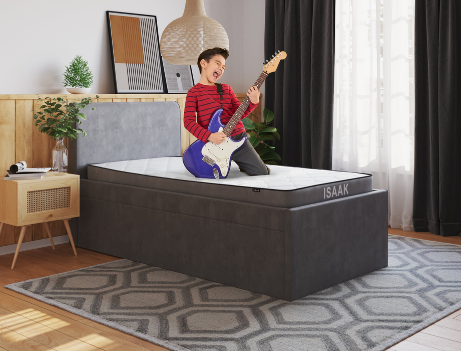 kid playing a guitar on a king single mattress on a bed frame in a bedroom from Isaak