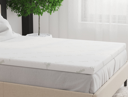 side view of a double mattress topper on a bed frame in a bedroom from Isaak