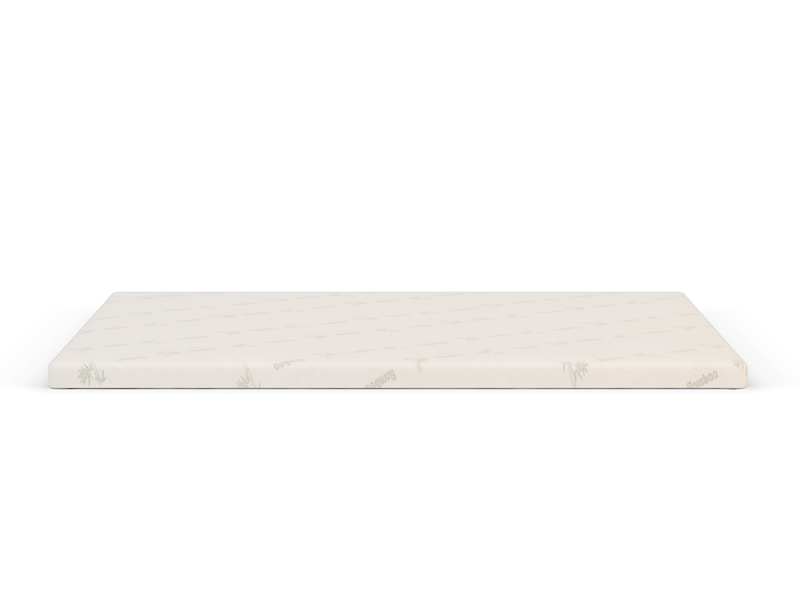 side view of a king mattress topper in white background