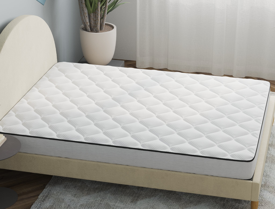 top view of a double mattress on a bed frame in a bedroom from Isaak