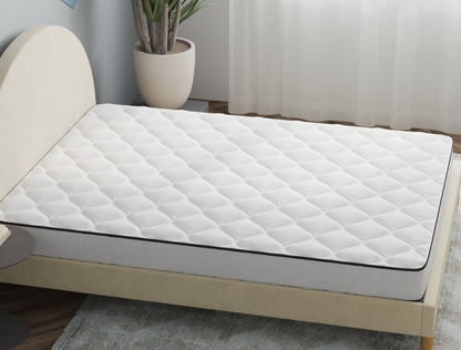 side view of a king mattress on a bed frame in a bedroom