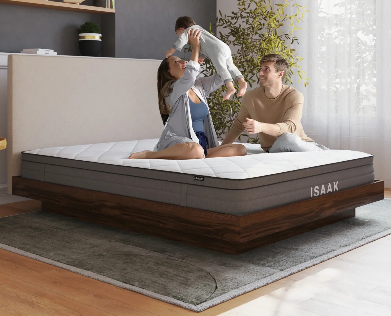 mom and dad with kid playing on a double mattress on a bed frame in a bedroom from Isaak