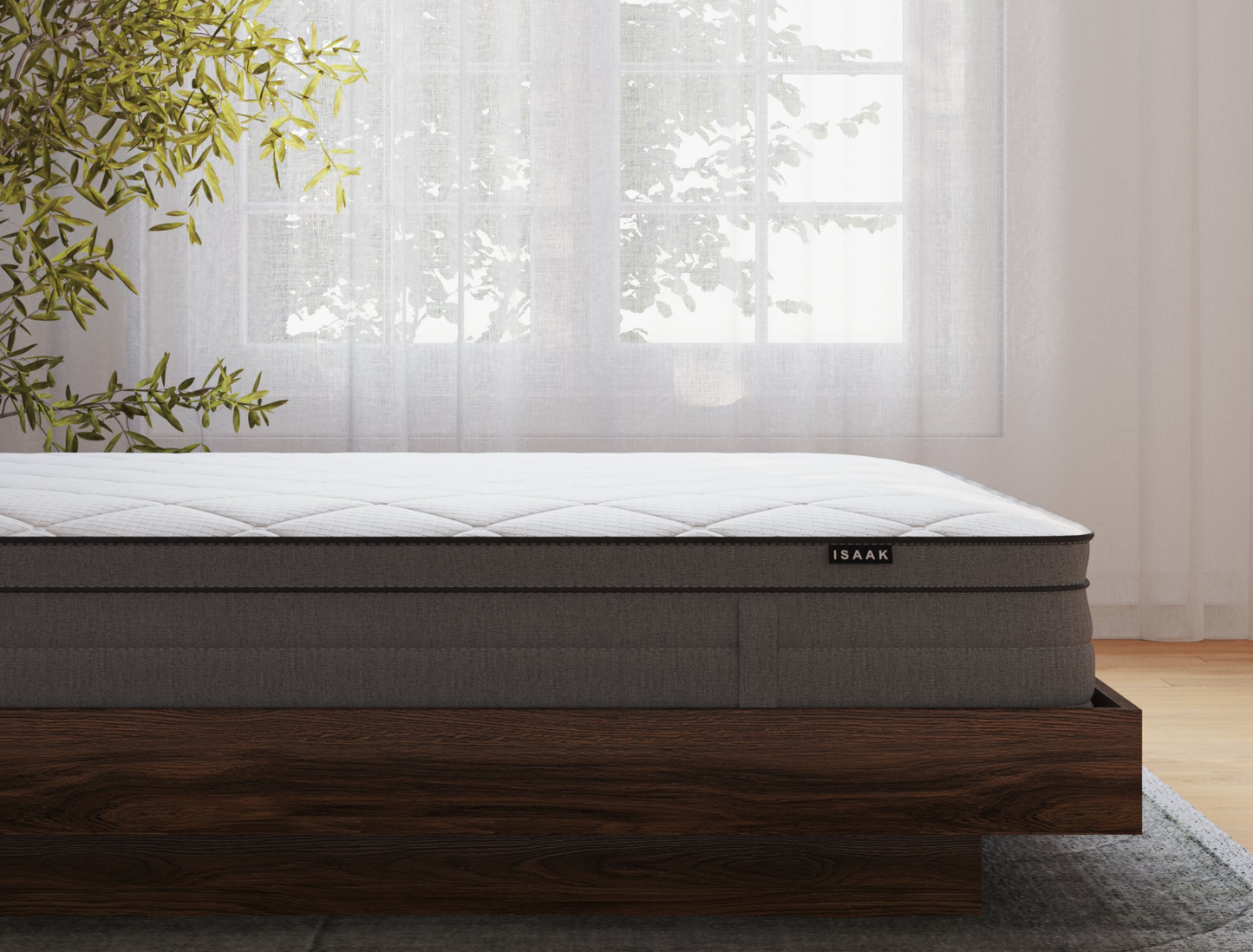 side view of a double mattress on a bed frame in a bedroom from Isaak