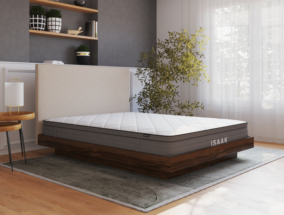 side view of a king mattress on a bedframe in a bedroom from Isaak 