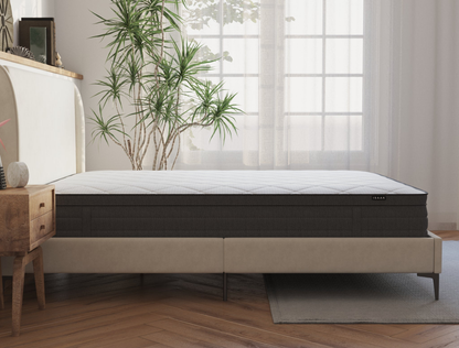 side view of a double mattress on a bed frame in a bedroom from Isaak