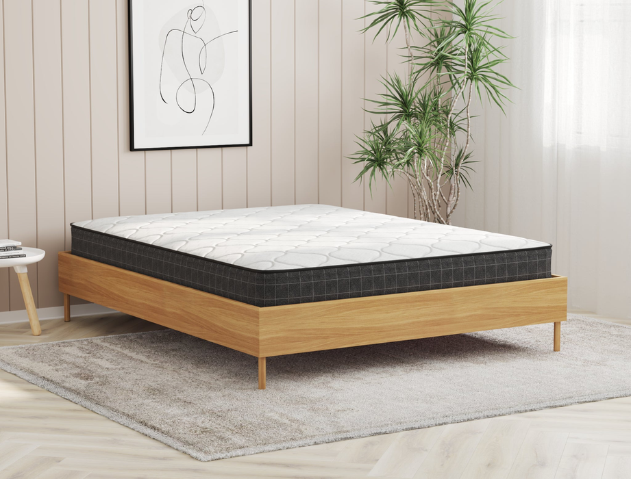 top view of a double mattress in a bed frame in a bedroom from Isaak