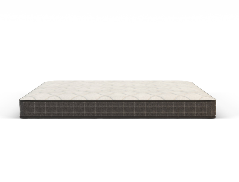 side view of a king single mattress in a white background from Isaak