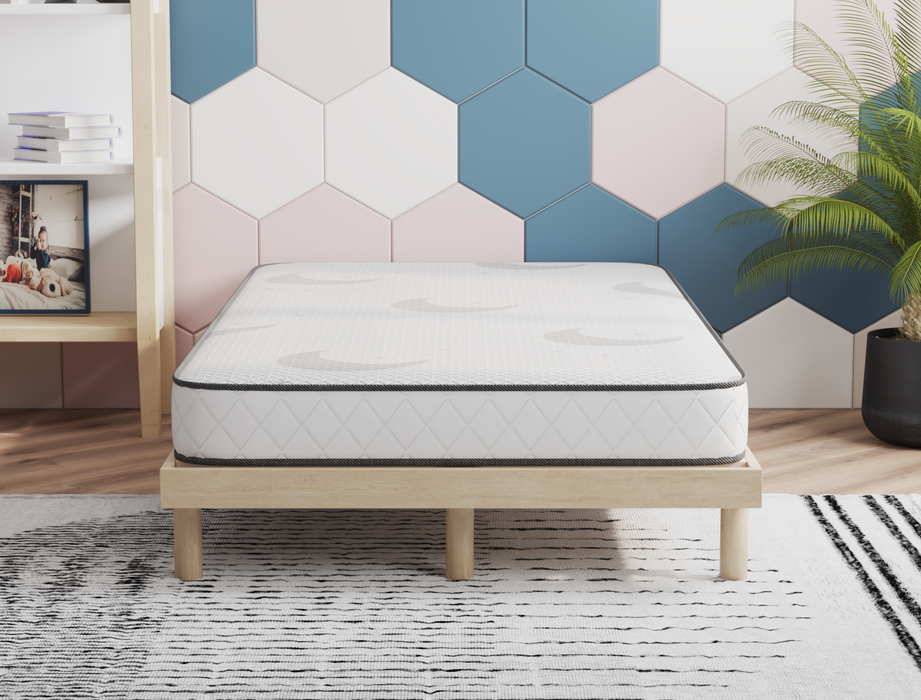 front view of a double mattress on a bed frame in a bedroom from Isaak