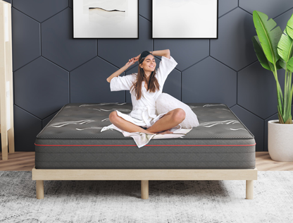 woman sitting on a double mattress on a bed frame in a bedroom from Isaak