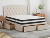 top view of a king mattress on a bed frame in a bedroom by Isaak