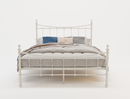 front view of a double bed frame with mattress and pillows in a white background from Isaak