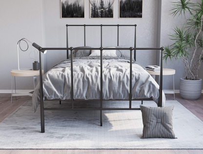 front view of a king single bed frame with mattress and pillows in a bedroom from Isaak