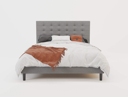 front view of a king single bed frame with mattress and pillows in a white background from Isaak