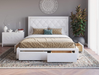 front view of a king bed frame with mattress and pillows in a bedroom from Isaak