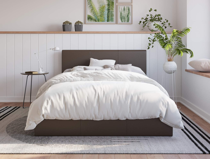 front view of a king single bed frame with mattress and pillows in a bedroom from Isaak