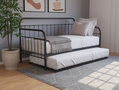 top view of a single bed frame with mattress and pillows in a bedroom from Isaak