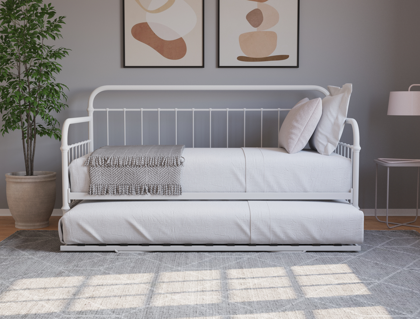 side view of a single bed frame with mattress and pillows in a bedroom from Isaak