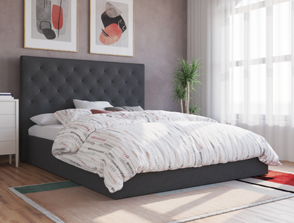 top view of a queen bed frame with mattress and pillows in a bedroom from Isaak