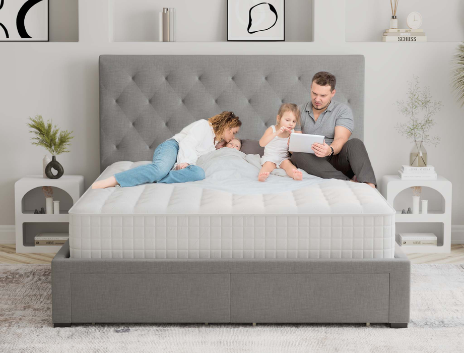 husband and wife with two kids on a double mattress on a bed frame in a bedroom from Isaak