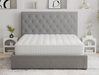 front view of a double mattress on a bed frame in a bedroom from Isaak