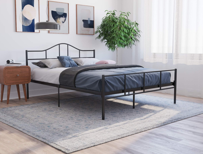 top view of a double bed frame with mattress and pillows in a bedroom from Isaak