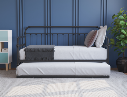 side view of a single bed frame with mattress and pillows in a bedroom from Isaak