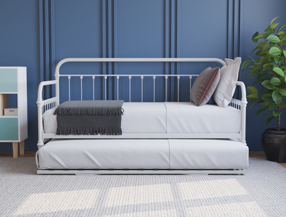 front view of a single bed frame with mattress and pillows in a bedroom from Isaak